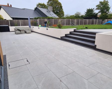 porcelain paving with planters and steps, designed.