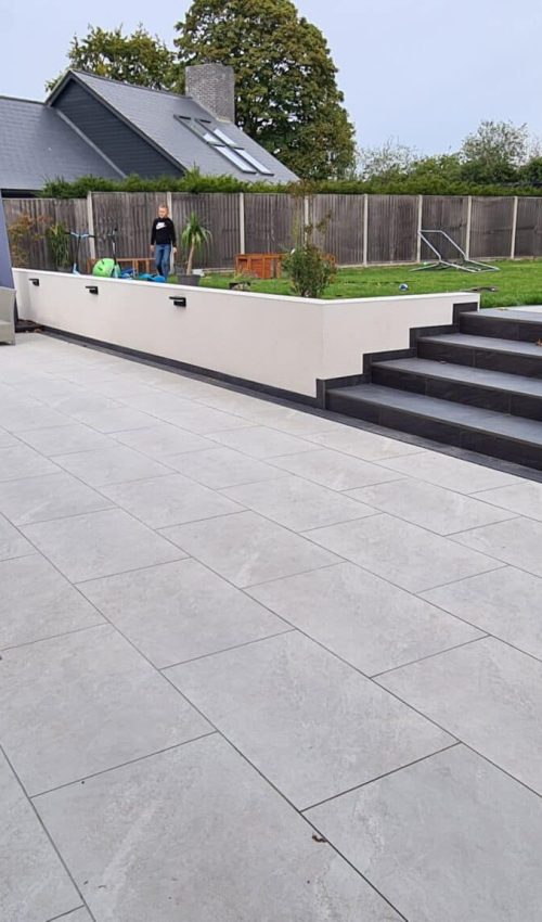 porcelain paving with planters and steps, designed.