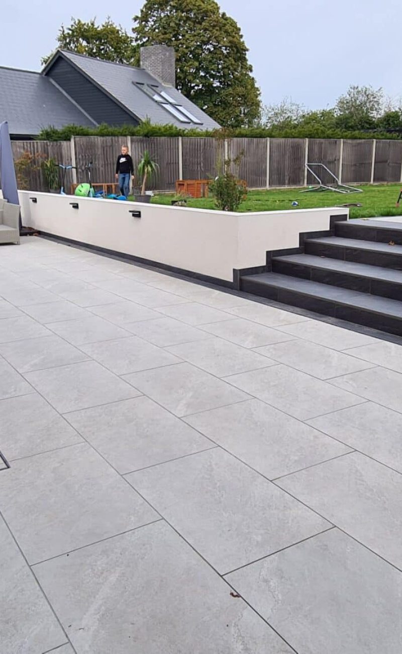porcelain paving with planters and steps, designed.